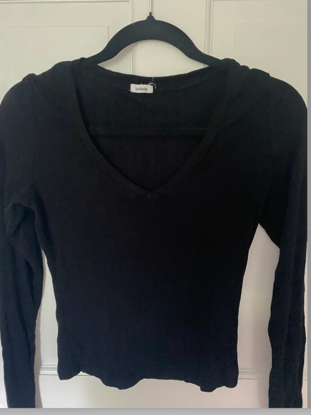 Long sleeved, ribbed black Garage Top